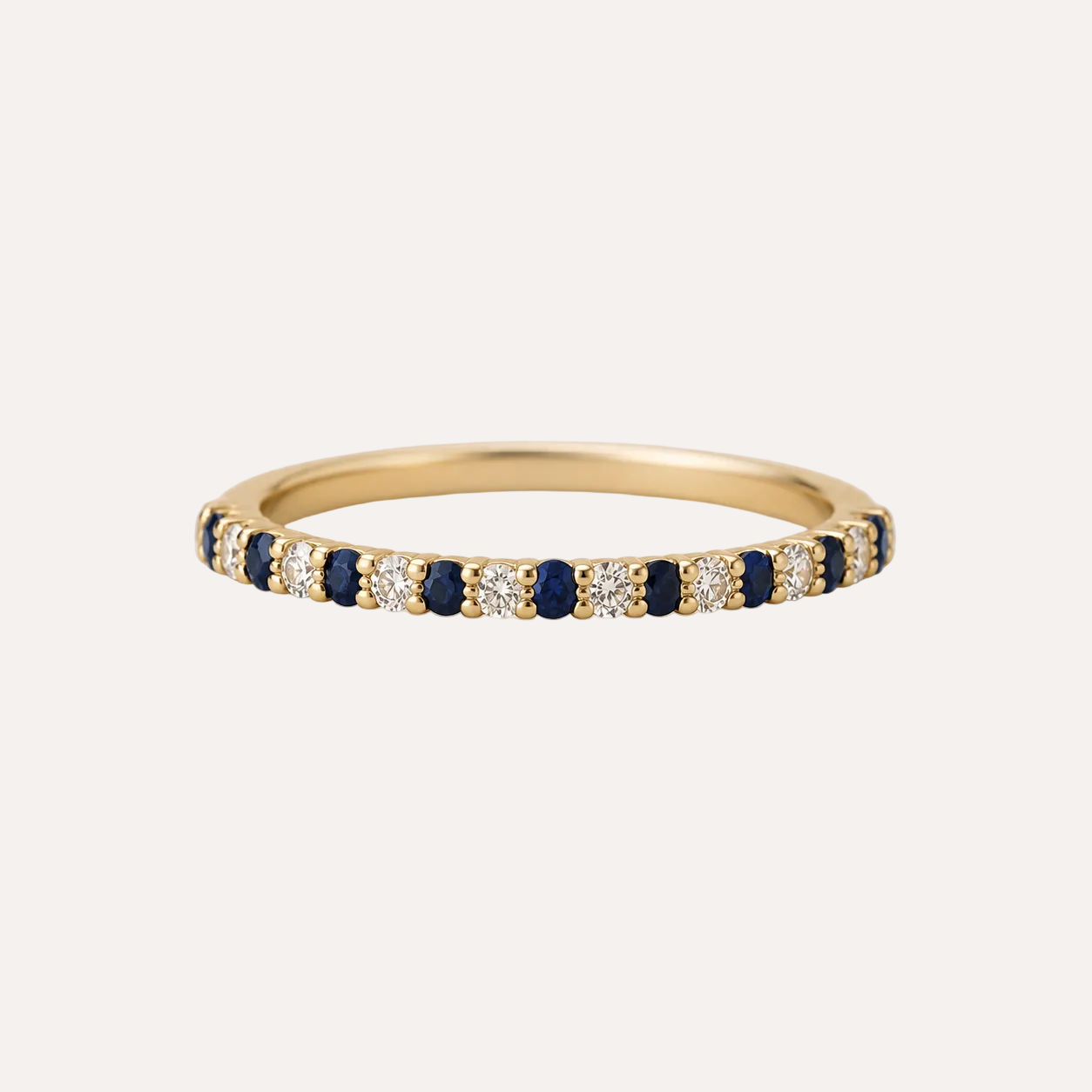 Blue Sapphire and Diamond half eternity ring