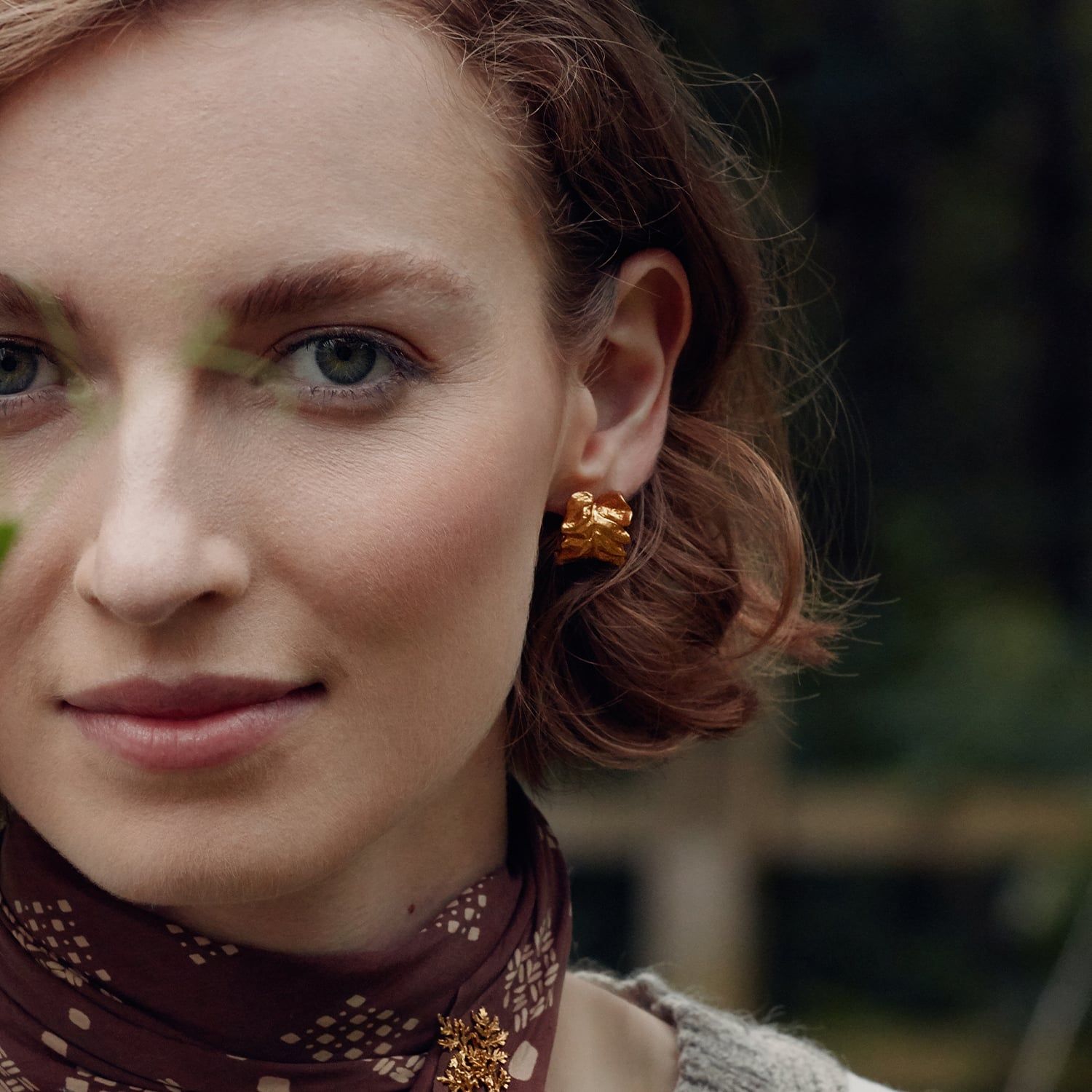chard leaf hoop earrings gold
