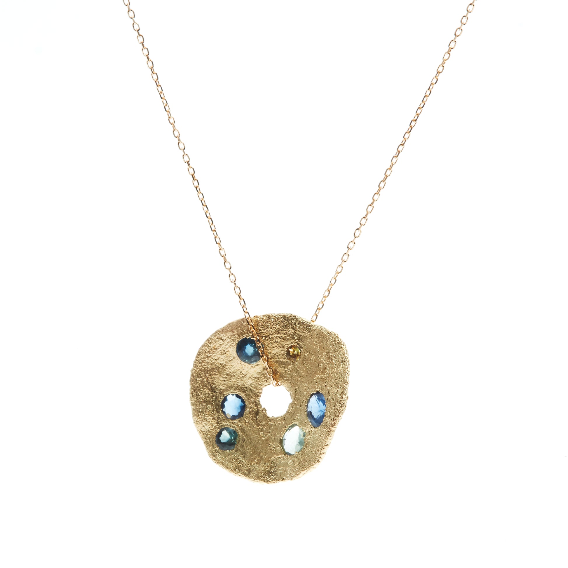 blue sapphire and gold circle pendant