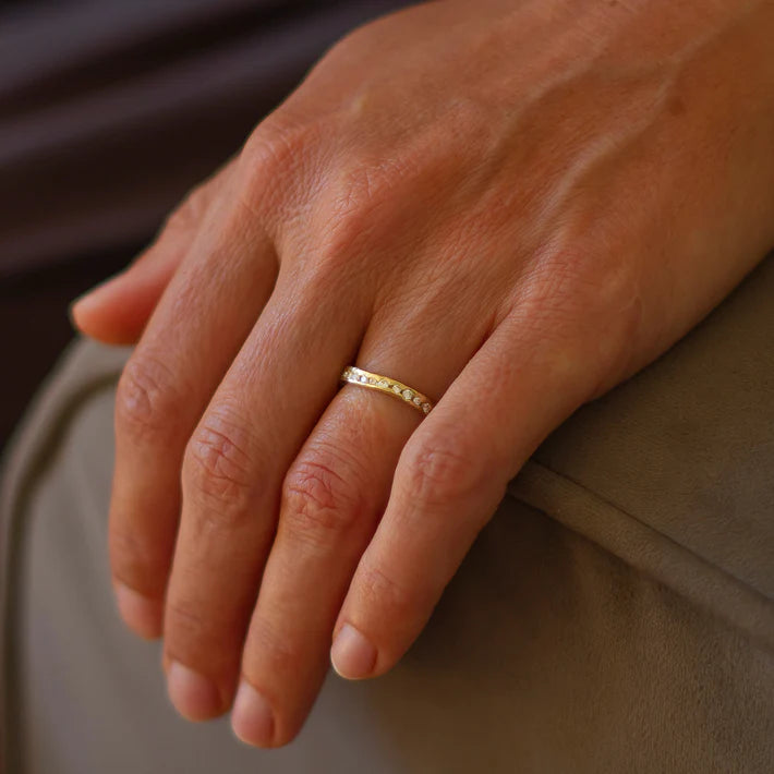 gold eternity ring worn