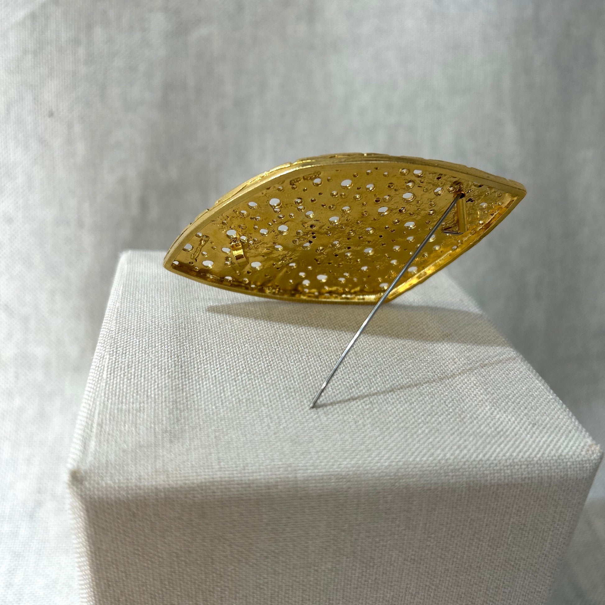 gold textured brooch