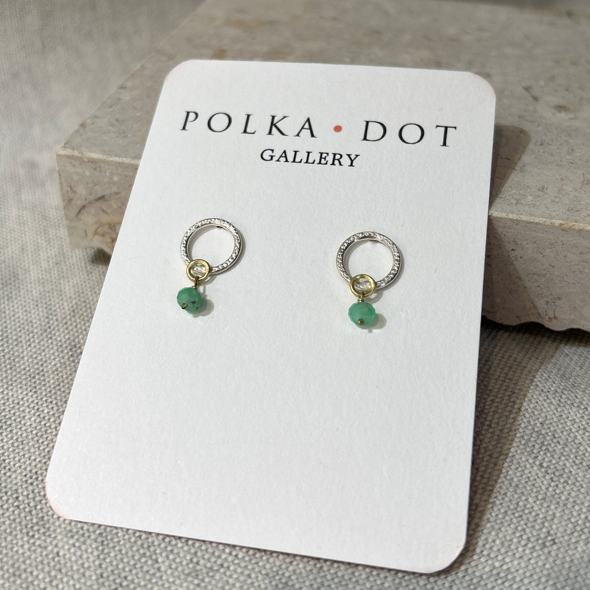 silver and green stone earrings