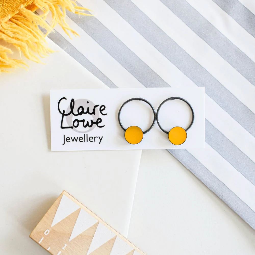 yellow circle studs